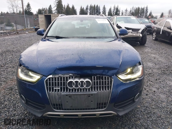 2014 Audi allroad A4 Premium Plus z VIN WA1UFAFL4EA121651, wystawiony jako IAAI lot #41579256 z przebiegiem 76 916 mil mil oraz . Historia ofert i sprzedaży dostępna na DreamBid. Obrazek 6.
