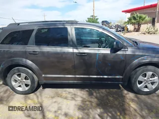 2017 Dodge Journey SE with VIN 3C4PDCAB9HT503979, listed as a IAAI auction lot 42116429 with 176,591 mi miles and . Bid and sale history available at DreamBid. Image 14.