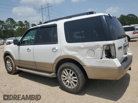 2013 Ford Expedition XLT with VIN 1FMJU1H56DEF26541, listed as a Copart auction lot 63206605 with 215,793 mi miles and Salvage title. Bid and sale history available at DreamBid. Image 2.