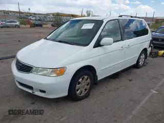 2001 Honda Odyssey EX z VIN 2HKRL18661H566973, wystawiony jako IAAI lot #42117015 z przebiegiem 206 999 mil mil oraz . Historia ofert i sprzedaży dostępna na DreamBid. Obrazek 2.