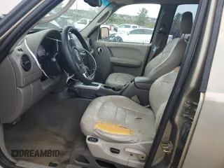 2004 Jeep Liberty Limited z VIN 1J4GL58K64W298687, wystawiony jako Copart lot #56677595 z przebiegiem 180 825 mil mil oraz Szkoda całkowita • Salvage title. Historia ofert i sprzedaży dostępna na DreamBid. Obrazek 7.