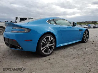 2011 Aston Martin V12 Vantage Carbon Black with VIN SCFEBBCF6BGS00579, listed as a Copart auction lot 79911294 with 34,191 mi miles and Salvage Title. Bid and sale history available at carsss.com. Image 3.