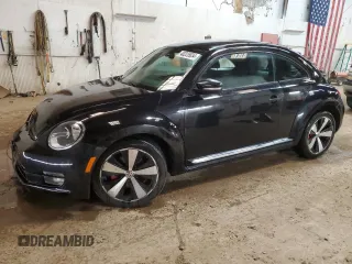 2012 Volkswagen Beetle 2.0T Turbo with VIN 3VWV67AT9CM643404, listed as a Copart auction lot 40225934 with 107,745 mi miles and Clean Title. Bid and sale history available at carsss.com. Image 1.
