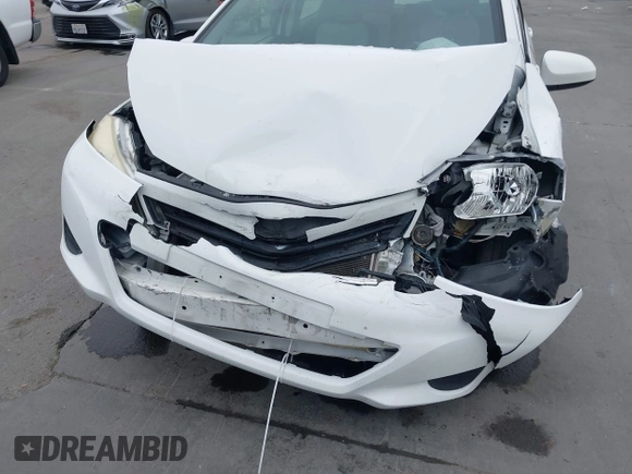 2012 Toyota Yaris L with VIN JTDKTUD38CD513912, listed as a IAAI auction lot 42131567 with 133,664 mi miles. Bid and sale history available at carsss.com. Image 6.