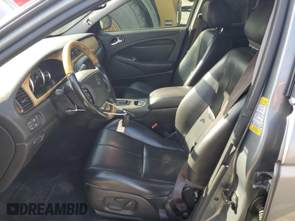 2005 Jaguar S-Type with VIN SAJWA01T15FN13800, listed as a Copart auction lot 53576305 with 182,533 mi miles and Salvage Title. Bid and sale history available at DreamBid. Image 7.