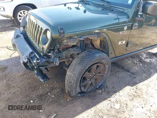 2008 Jeep Wrangler Unlimited X with VIN 1J8GA39118L594626, listed as a IAAI auction lot 41618878 with 166,071 mi miles and . Bid and sale history available at DreamBid. Image 6.
