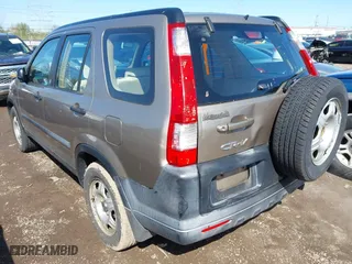 2006 Honda CR-V LX with VIN SHSRD68516U404121, listed as a IAAI auction lot 41981673 with 229,028 mi miles. Bid and sale history available at carsss.com. Image 3.