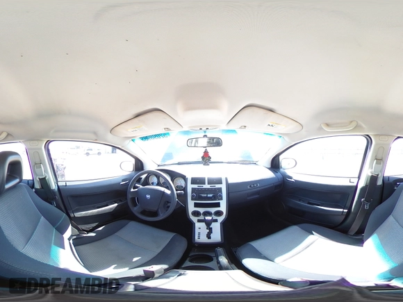 2009 Dodge Caliber SXT with VIN 1B3HB48A99D157051, listed as a Copart auction lot 52098965 with 188,268 mi miles and Salvage Title. Bid and sale history available at carsss.com. Image 13.