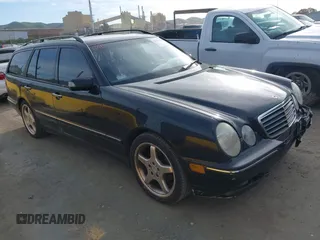 2001 Mercedes-Benz E-Class with VIN WDBJH65JX1B290284, listed as a IAAI auction lot 41713265 with 1 mi miles. Bid and sale history available at carsss.com. Image 1.