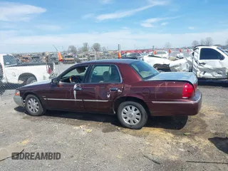 2003 Mercury Grand Marquis LS Premium z VIN 2MEFM75W73X650193, wystawiony jako IAAI lot #41803310 z przebiegiem 151 719 mil mil oraz . Historia ofert i sprzedaży dostępna na DreamBid. Obrazek 14.