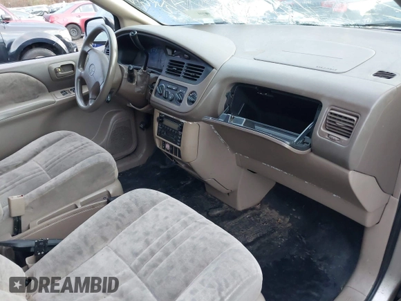 2002 Toyota Sienna LE with VIN 4T3ZF13C92U444185, listed as a IAAI auction lot 39003187 with 999,999 mi miles. Bid and sale history available at carsss.com. Image 5.