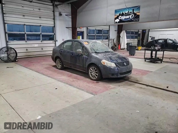 2011 Suzuki SX4 LE with VIN JS2YC5A20B6304734, listed as a Copart auction lot 87377154 with 190,761 mi miles and Salvage Title. Bid and sale history available at carsss.com. Image 10.