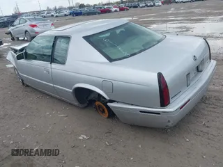 1999 Cadillac Eldorado Touring with VIN 1G6ET1294XU611850, listed as a IAAI auction lot 42015876 with 67,845 mi miles and . Bid and sale history available at DreamBid. Image 3.