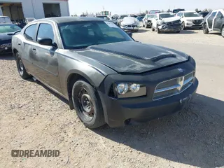 2008 Dodge Charger with VIN 2B3KA43R38H159336, listed as a IAAI auction lot 41897188 with 128,808 mi miles. Bid and sale history available at carsss.com. Image 1.
