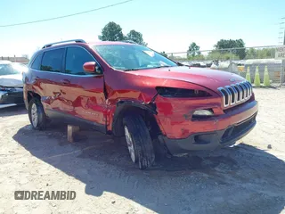 2015 Jeep Cherokee North with VIN 1C4PJMCSXFW654090, listed as a IAAI auction lot 41844434 with 198,592 mi miles. Bid and sale history available at carsss.com. Image 1.