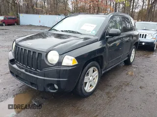 2008 Jeep Compass Sport with VIN 1J8FT47028D725448, listed as a IAAI auction lot 41972561 with 198,524 mi miles. Bid and sale history available at carsss.com. Image 6.