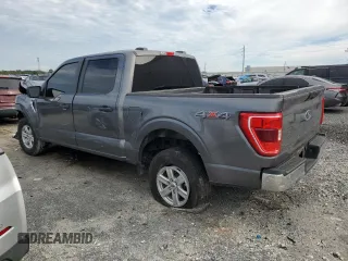 2023 Ford F-150 XL with VIN 1FTEW1EB0PKE65574, listed as a Copart auction lot 88522215 with 80,828 mi miles and Salvage Title. Bid and sale history available at carsss.com. Image 2.