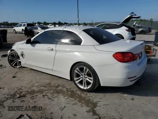 2016 BMW 4 Series 428i with VIN WBA3V7C57G5A27594, listed as a Copart auction lot 87968815 with 55,058 mi miles and Salvage title. Bid and sale history available at DreamBid. Image 2.