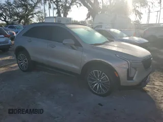 2024 Cadillac XT4 FWD Sport with VIN 1GYFZER49RF240140, listed as a Copart auction lot 78022704 with 401 mi miles and Salvage title. Bid and sale history available at DreamBid. Image 4.