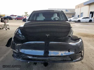 2023 Tesla Model Y Long Range with VIN 7SAYGDEE3PF938230, listed as a Copart auction lot 47883385 with 28,461 mi miles and Salvage Title. Bid and sale history available at carsss.com. Image 5.