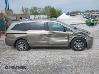2013 Honda Odyssey EX-L with VIN 5FNRL5H65DB064238, listed as a IAAI auction lot 42050743 with 189,437 mi miles and . Bid and sale history available at carsss.com. Image 13.