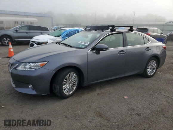 2015 Lexus ES 330 with VIN JTHBK1GGXF2154853, listed as a Copart auction lot 64828665 with 75,119 mi miles and Salvage title. Bid and sale history available at DreamBid. Image 1.