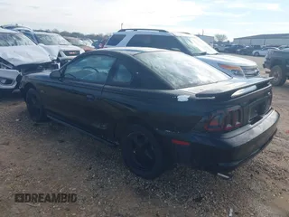 1998 Ford Mustang GT z VIN 1FAFP42X3WF104453, wystawiony jako IAAI lot #41551590 z przebiegiem 109 517 mil mil oraz . Historia ofert i sprzedaży dostępna na DreamBid. Obrazek 3.