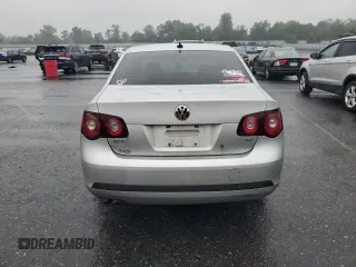 2010 Volkswagen Jetta TDI with VIN 3VWRL7AJXAM028463, listed as a Copart auction lot 60912445 with 242,906 mi miles and Salvage title. Bid and sale history available at DreamBid. Image 6.