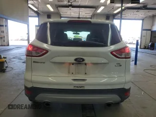 2016 Ford Escape SE с VIN 1FMCU9GX8GUA99979, выставлен на аукционе Copart как лот 57623295 с пробегом 124 813 миль миль и Списание • Salvage title. История ставок и продаж доступна на DreamBid. Изображение 6.