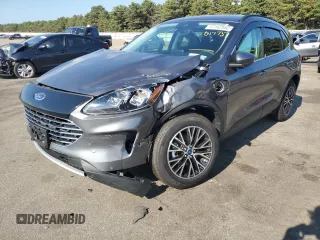 2021 Ford Escape Titanium Plug-In Hybrid z VIN 1FMCU0LZ1MUB17737, wystawiony jako Copart lot #57162592 z przebiegiem Nie podano mil oraz . Historia ofert i sprzedaży dostępna na DreamBid. Obrazek 2.