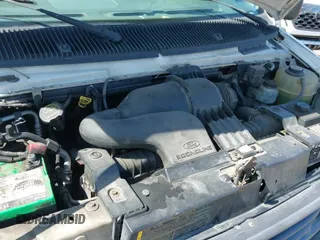 2006 Ford Econoline Cargo with VIN 1FTRE14W56HA74084, listed as a IAAI auction lot 42538155 with 319,655 mi miles and . Bid and sale history available at DreamBid. Image 19.