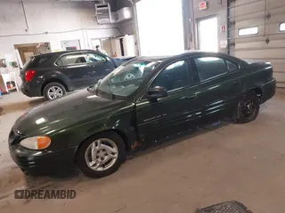 2000 Pontiac Grand Am SE1 with VIN 1G2NF52T6YC546633, listed as a IAAI auction lot 41905243 with 118,017 mi miles. Bid and sale history available at carsss.com. Image 2.