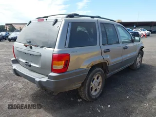 2001 Jeep Grand Cherokee Laredo with VIN 1J4GW48S11C503427, listed as a IAAI auction lot 40004360 with 232,712 mi miles and . Bid and sale history available at DreamBid. Image 4.