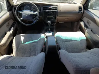 2000 Toyota 4Runner SR5 z VIN JT3GN86R0Y0154518, wystawiony jako Copart lot #60098695 z przebiegiem 174 071 mil mil oraz Szkoda całkowita • Salvage title. Historia ofert i sprzedaży dostępna na DreamBid. Obrazek 8.