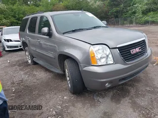 2007 GMC Yukon SLE z VIN 1GKFK13087J146287, wystawiony jako IAAI lot #42061606 z przebiegiem 237 106 mil mil oraz . Historia ofert i sprzedaży dostępna na DreamBid. Obrazek 1.