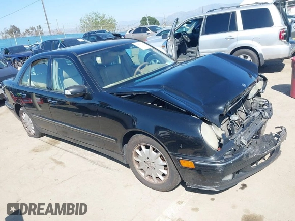 2001 Mercedes-Benz E-Class with VIN WDBJF65J11B368277, listed as a IAAI auction lot 41855716 with 207,864 mi miles. Bid and sale history available at carsss.com. Image 1.