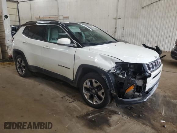 2018 Jeep Compass Limited with VIN 3C4NJDCB1JT212613, listed as a Copart auction lot 58320955 with 124,242 mi miles and Salvage title. Bid and sale history available at DreamBid. Image 4.