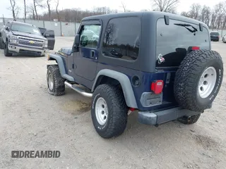 2006 Jeep Wrangler Sport with VIN 1J4FA49S16P737060, listed as a IAAI auction lot 41784197 with 42,030 mi miles. Bid and sale history available at carsss.com. Image 3.