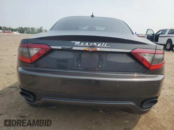 2014 Maserati GranTurismo Sport z VIN ZAM45VLA8E0114481, wystawiony jako Copart lot #58769155 z przebiegiem 45 313 mil mil oraz Szkoda całkowita • Salvage title. Historia ofert i sprzedaży dostępna na DreamBid. Obrazek 6.