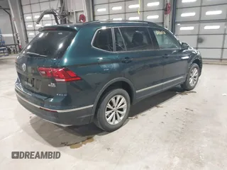 2018 Volkswagen Tiguan SEL with VIN 3VV2B7AX8JM113976, listed as a IAAI auction lot 42310576 with 100,319 mi miles and . Bid and sale history available at DreamBid. Image 4.