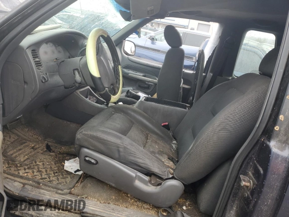 2001 Ford Explorer Sport с VIN 1FMYU70E11UB04952, выставлен на аукционе Copart как лот 43765175 с пробегом 208 223 миль миль и Списание • Salvage title. История ставок и продаж доступна на DreamBid. Изображение 7.