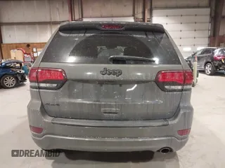 2019 Jeep Grand Cherokee Laredo E with VIN 1C4RJFAG9KC667394, listed as a IAAI auction lot 41316264 with 55,156 mi miles. Bid and sale history available at carsss.com. Image 16.