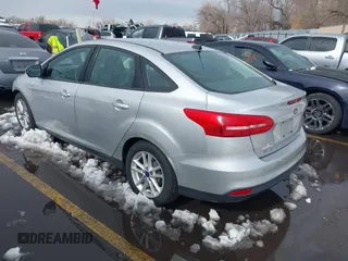 2016 Ford Focus SE with VIN 1FADP3F21GL325603, listed as a IAAI auction lot 41562523 with 97,749 mi miles. Bid and sale history available at carsss.com. Image 3.