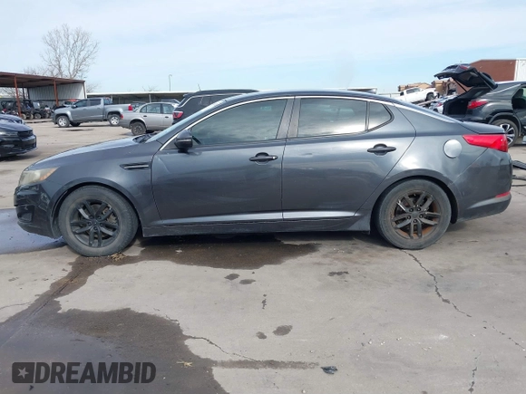 2011 Kia Optima LX with VIN KNAGM4A72B5057583, listed as a IAAI auction lot 41649320 with 207,898 mi miles and . Bid and sale history available at DreamBid. Image 14.