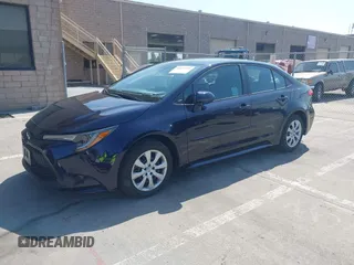 2020 Toyota Corolla LE with VIN 5YFEPRAE5LP145142, listed as a IAAI auction lot 42153289 with 35,010 mi miles and . Bid and sale history available at DreamBid. Image 2.
