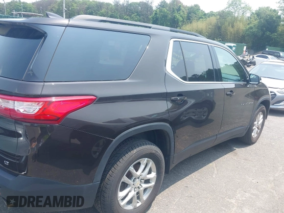 2019 Chevrolet Traverse LT Cloth z VIN 1GNEVGKW3KJ102804, wystawiony jako IAAI lot #42492949 z przebiegiem 144 895 mil mil oraz . Historia ofert i sprzedaży dostępna na DreamBid. Obrazek 13.