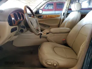 1999 Jaguar XJ with VIN SAJKX6046XC855872, listed as a Copart auction lot 47060465 with 65,286 mi miles and Clean title. Bid and sale history available at DreamBid. Image 7.