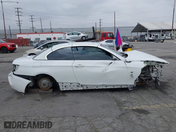 2011 BMW 3 Series 335i with VIN WBADX7C50BE579944, listed as a IAAI auction lot 42111612 with Not Provided miles and . Bid and sale history available at carsss.com. Image 13.
