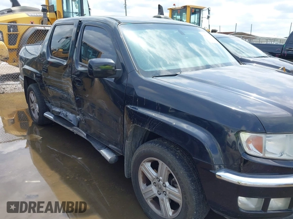 2011 Honda Ridgeline RTL with VIN 5FPYK1F54BB011472, listed as a IAAI auction lot 42112512 with 194,974 mi miles and . Bid and sale history available at DreamBid. Image 6.
