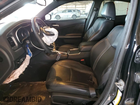 2015 Dodge Charger SXT with VIN 2C3CDXJG9FH748809, listed as a Copart auction lot 61682335 with 128,252 mi miles and Salvage title. Bid and sale history available at DreamBid. Image 7.